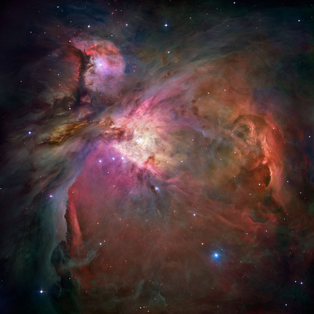 This dramatic image offers a peek inside a cavern of roiling dust and gas where thousands of stars are forming. More than 3,000 stars of various sizes appear in this image. The image, taken by the Advanced Camera for Surveys (ACS) aboard NASA's Hubble Space Telescope, represents the sharpest view ever taken of this region, called the Orion Nebula. The Orion Nebula is 1,500 light-years away, the nearest star-forming region to Earth. Astronomers used 520 Hubble images, taken in five colors, to make this picture. They also added ground-based photos to fill out the nebula.