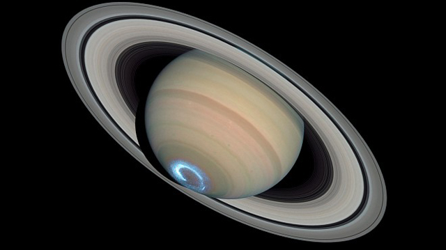 Saturn's aurora composite of optical and ultraviolet images in 2004  (Hubble Space Telescope)