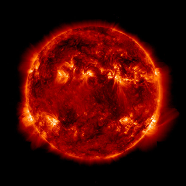 Composit of images of  the June 6, 2000 solar flare taken in white ligh tand ultraviolet (TRACE)