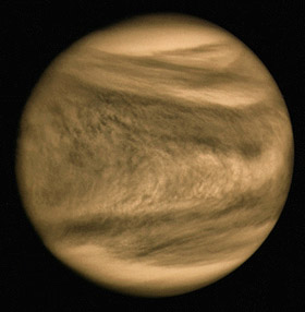 Figure 5 - Ultraviolet image of Venus taken by the Mariner 10 spacecraft in 1973 during a fly-by. Although it appears featureless to Earth-bound optical telescopes ,the atmosphere has a distinct, banded structure to it, produced by atmospheric winds and solar heating.