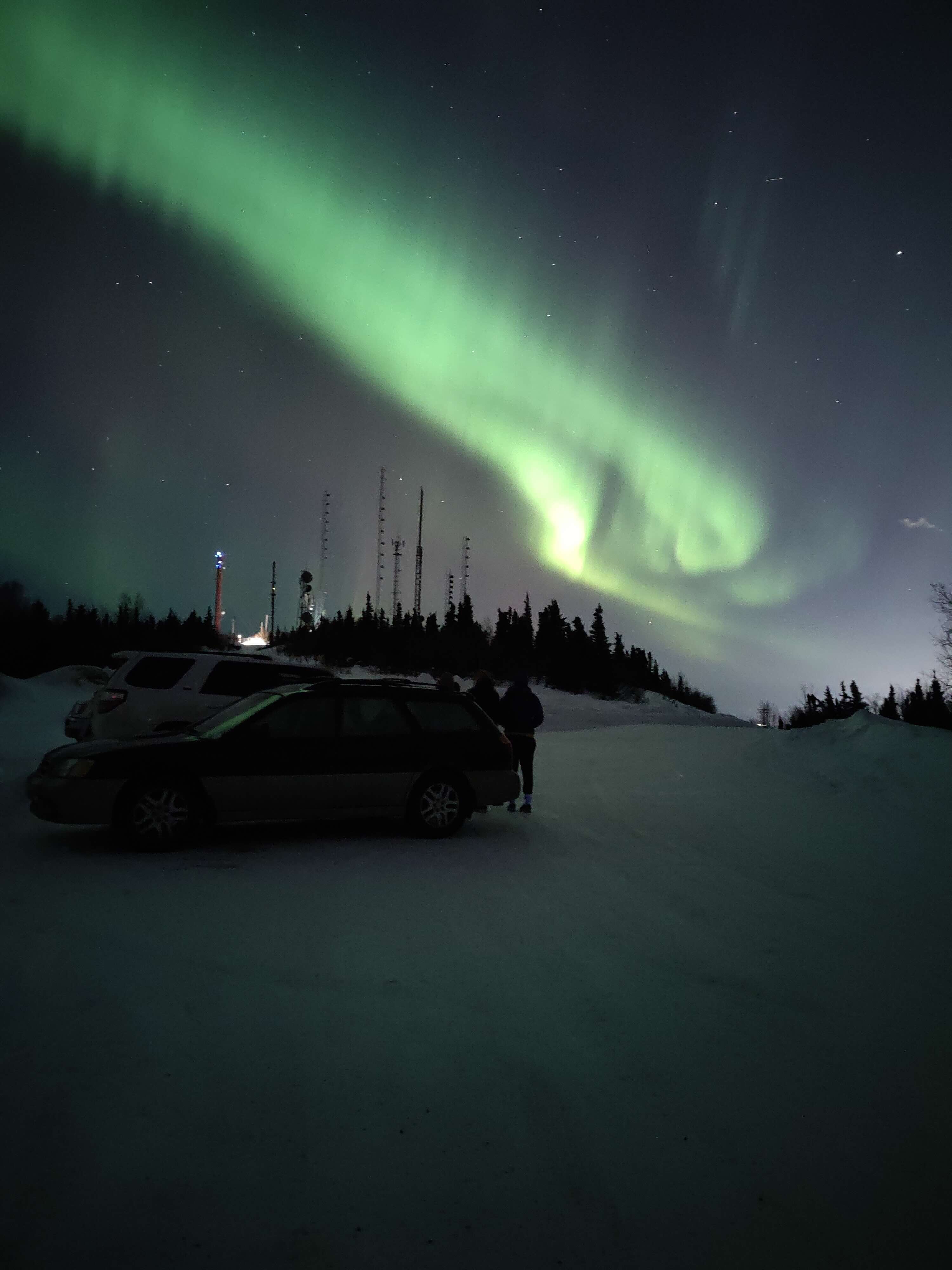 This photo was taken during an active geomagnetic storm in Fairbanks, Alaska, on March 23, 2023—one of my favorite aurora shots. There's a small hill spot near the UAF campus where people often gather during predicted aurora activity. The bright auroral arcs here indicate intense particle precipitation. I really love how my research connects so vividly with real-world auroral displays!